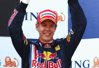 ISTANBUL, TURKEY - JUNE 07:  Sebastian Vettel of Germany and Red Bull Racing celebrates on the podium after finishing third in the Turkish Formula One Grand Prix at Istanbul Park on June 7, 2009, in Istanbul, Turkey.  (Photo by Paul Gilham/Getty Images)