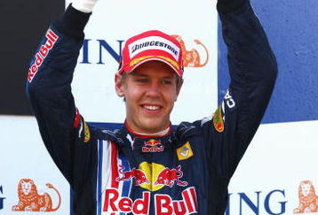 ISTANBUL, TURKEY - JUNE 07:  Sebastian Vettel of Germany and Red Bull Racing celebrates on the podium after finishing third in the Turkish Formula One Grand Prix at Istanbul Park on June 7, 2009, in Istanbul, Turkey.  (Photo by Paul Gilham/Getty Images)