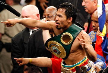 LAS VEGAS - MAY 02:  Manny Pacquiao of the Philippines celebrates after knocking out Ricky Hatton of England in the second round of their junior welterweight title fight at the MGM Grand Garden Arena May 2, 2009 in Las Vegas, Nevada.  (Photo by Ethan Miller/Getty Images)