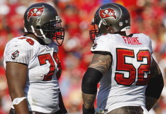 KANSAS CITY, MO - NOVEMBER 02:  Jeremy Zuttah #76 of the Tampa Bay Buccaneers talks with teammate Jeff Faine #52 during the NFL game against the Kansas City Chiefs on November 2, 2008 at Arrowhead Stadium in Kansas City, Missouri.  The Buccaneers won 30 to 27 in overtime. (Photo by: Jamie Squire/Getty Images)