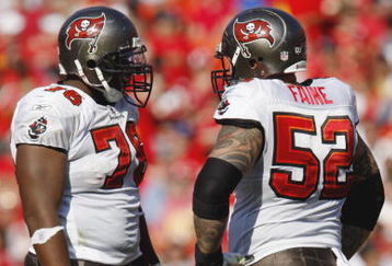 KANSAS CITY, MO - NOVEMBER 02:  Jeremy Zuttah #76 of the Tampa Bay Buccaneers talks with teammate Jeff Faine #52 during the NFL game against the Kansas City Chiefs on November 2, 2008 at Arrowhead Stadium in Kansas City, Missouri.  The Buccaneers won 30 to 27 in overtime. (Photo by: Jamie Squire/Getty Images)
