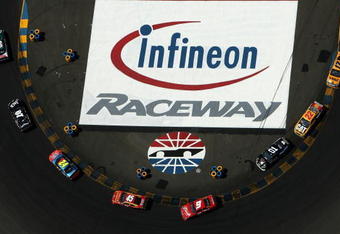 SONOMA, CA - JUNE 22:  A pack of cars races during the NASCAR Sprint Cup Series Toyota/Save Mart 350 at the Infineon Raceway on June 22, 2008 in Sonoma, California.  (Photo by Jonathan Ferrey/Getty Images )