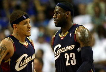 ORLANDO, FL - MAY 30: LeBron James #23 of the Cleveland Cavaliers reacts with Delonte West #13 after drawing a foul against the Orlando Magic in Game Six of the Eastern Conference Finals during the 2009 Playoffs at Amway Arena on May 30, 2009 in Orlando, Florida. NOTE TO USER: User expressly acknowledges and agrees that, by downloading and or using this photograph, User is consenting to the terms and conditions of the Getty Images License Agreement  (Photo by Elsa/Getty Images)