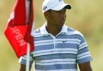 FARMINGDALE, NY - JUNE 15:  Tiger Woods looks on from a green during the first day of previews to the 109th U.S. Open on the Black Course at Bethpage State Park on June 15, 2009 in Farmingdale, New York.  (Photo by Scott Halleran/Getty Images)
