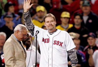 BOSTON - SEPTEMBER 30:  Former Boston Red Sox legend, Wade Boggs, waves to the crowd before throwing out the first picth prior to the game between the Boston Red Sox and the New York Yankees at Fenway Park on September 30, 2005 in Boston, Massachusetts.  (Photo by Jim McIsaac/Getty Images)