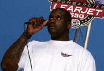 FORT WORTH, TX - JUNE 06:  NBA All-Star Shaquille O'Neal gives the command for drivers to start their engines prior to the IRL IndyCar Series Bombardier Learjet 550k on June 6, 2009 at Texas Motor Speedway in Fort Worth, Texas.  (Photo by Darrell Ingham/Getty Images)