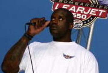 FORT WORTH, TX - JUNE 06:  NBA All-Star Shaquille O'Neal gives the command for drivers to start their engines prior to the IRL IndyCar Series Bombardier Learjet 550k on June 6, 2009 at Texas Motor Speedway in Fort Worth, Texas.  (Photo by Darrell Ingham/Getty Images)