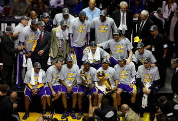 ORLANDO, FL - JUNE 14:  The Los Angeles Lakers celebrate after defeating the Orlando Magic 99-86 in Game Five of the 2009 NBA Finals to win the NBA Championship on June 14, 2009 at Amway Arena in Orlando, Florida.  NOTE TO USER:  User expressly acknowledges and agrees that, by downloading and or using this photograph, User is consenting to the terms and conditions of the Getty Images License Agreement.  (Photo by Chris Graythen/Getty Images)