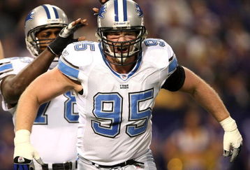 MINNEAPOLIS - DECEMBER 2:  Defensive linemen Jared DeVries #95 and Cory Redding #78 of the Detroit Lions celebrate DeVries' sack against the Minnesota Vikings at the Metrodome December 2, 2007 in Minneapolis, Minnesota. The Vikings won 42-10.  (Photo by Stephen Dunn/Getty Images)