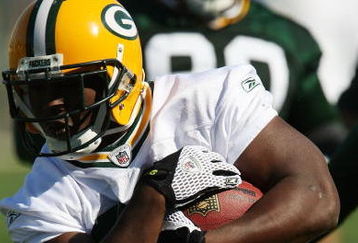 GREEN BAY, WI - JULY 28: Brandon Jackson #32 of the Green Bay Packers runs with the ball during summer training camp on July 28, 2008 at the Hutson Center in Green Bay, Wisconsin. (Photo by Jonathan Daniel/Getty Images)