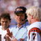 ANAHEIM, CA - OCTOBER 7:  Head coach Sam Wyche of the Cincinnati Bengals talks to his quarterback Boomer Esiason #7 on the sidelines during a game against the Los Angeles Rams at the Anaheim Stadium on October 7, 1990 in Anaheim, California.  The Bengals won 34-31.  (Photo by George Rose/Getty Images)