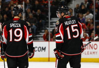 OTTAWA - MARCH 11:  Jason Spezza #19 and Dany Heatley #15 of the Ottawa Senators stand on the ice during the game against the Tampa Bay Lightning on March 11, 2009 at the Scotiabank Place in Ottawa, Ontario, Canada. (Photo by Phillip MacCallum/Getty Images)
