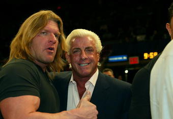 NEW YORK - MARCH 9: WWE wrestlers Triple H and Ric Flair attend the New York Knicks v Boston Celtics  NBA game March 9, 2004 at Madison Square Garden in New York City.   (Photo by Ray Amati/Getty Images)