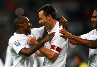 LONDON, ENGLAND - JUNE 10:  Jermain Defoe (L) of England celebrates scoring the 5th goal of the game with John Terry and Glen Johnson during the FIFA 2010 World Cup Group 6 Qualifying match between England and Andorra at Wembley Stadium on June 10, 2009 in London, England.  (Photo by Phil Cole/Getty Images)