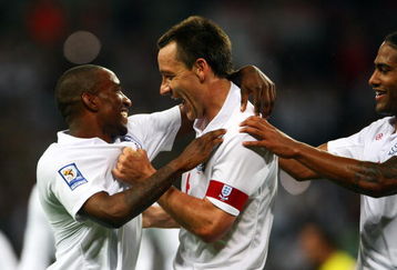 LONDON, ENGLAND - JUNE 10:  Jermain Defoe (L) of England celebrates scoring the 5th goal of the game with John Terry and Glen Johnson during the FIFA 2010 World Cup Group 6 Qualifying match between England and Andorra at Wembley Stadium on June 10, 2009 in London, England.  (Photo by Phil Cole/Getty Images)