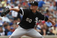 CHICAGO - JUNE 17: Starting pitcher John Danks #50 of the Chicago White Sox delivers the ball against the Chicago Cubs on June 17, 2009 at Wrigley Field in Chicago, Illinois. (Photo by Jonathan Daniel/Getty Images)