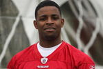 SANTA CLARA, CA - MAY 01:  Michael Crabtree #15 of the San Francisco 49ers looks on at practice during the 49ers Minicamp at their training facilities on May 1, 2009 in Santa Clara, California. Crabtree was the 49ers first round draft pick.  (Photo by Jed Jacobsohn/Getty Images)