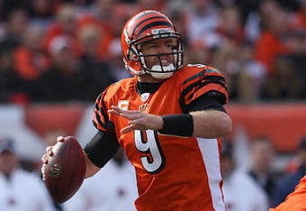 CINCINNATI - NOVEMBER 25:  Carson Palmer #9 of the Cincinnati Bengals fades back to pass during the NFL game against the Tennessee Titans at Paul Brown Stadium on November 25, 2007 in Cincinnati, Ohio. (Photo by Andy Lyons/Getty Images)