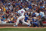 CHICAGO - AUGUST 13:  Sammy Sosa #21 of the Chicago Cubs watches the flight of the ball as he follows through on a swing during the game against the Los Angeles Dodgers at Wrigley Field on August 13, 2004 in Chicago, Illinois. The Dodgers won 8- 1.  (Photo by Jonathan Daniel/Getty Images)