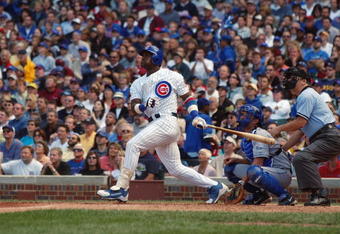 CHICAGO - AUGUST 13:  Sammy Sosa #21 of the Chicago Cubs watches the flight of the ball as he follows through on a swing during the game against the Los Angeles Dodgers at Wrigley Field on August 13, 2004 in Chicago, Illinois. The Dodgers won 8- 1.  (Photo by Jonathan Daniel/Getty Images)