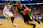 PHILADELPHIA - MARCH 19:  Eric Maynor #3 of the VCU Rams drives against Darren Collison #2 of the UCLA Bruins during the first round of the NCAA Division I Men's Basketball Tournament at the Wachovia Center on March 19, 2009 in Philadelphia, Pennsylvania.  (Photo by Jim McIsaac/Getty Images)