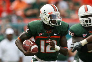 MIAMI - OCTOBER 25:  Quarterback Jacory Harris #12 of the Miami Hurricanes looks for room to run while taking on the Wake Forest Demon Decons at Dolphin Stadium on October 25, 2008 in Miami, Florida. Miami defeated Wake Forest 16-10.  (Photo by Doug Benc/Getty Images)