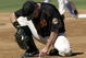 SCOTTSDALE, AZ - MARCH 8: First baseman J.T. Snow #6 of the San Francisco Giants takes a moment to recover after diving unsuccesffully for a line drive against the Kansas City Royals during their spring training game on March 8, 2004 at Scottsdale Stadium in Scottsdale, Arizona. (Photo by Stephen Dunn/Getty Images)