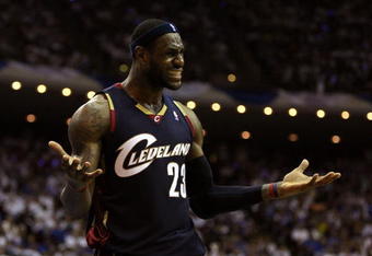 ORLANDO, FL - MAY 30:  LeBron James #23 of the Cleveland Cavaliers reacts after a play against the Orlando Magic in Game Six of the Eastern Conference Finals during the 2009 Playoffs at Amway Arena on May 30, 2009 in Orlando, Florida. NOTE TO USER: User expressly acknowledges and agrees that, by downloading and or using this photograph, User is consenting to the terms and conditions of the Getty Images License Agreement  (Photo by Elsa/Getty Images)