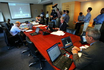 NEW YORK - JUNE 7:  Frank Marcos (R), Director of the Scouting Bureau, and Roy Krasik (Center-R), Senior Director of Major League Baseball Operations, and other individuals conduct the Major League Baseball draft on June 7, 2005 at the Major League Baseball offices in New York City. The draft was conducted via conference call.  (Photo by Ezra Shaw/Getty Images)