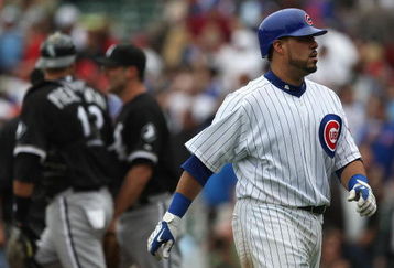 CHICAGO - JUNE 17: Geovany Soto #18 of the Chicago Cubs walks back to the dugout after making the last out against the Chicago White Sox on June 17, 2009 at Wrigley Field in Chicago, Illinois. The White Sox defeated the Cubs 4-1. (Photo by Jonathan Daniel/Getty Images)