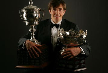 TORONTO, ON - JUNE 12:  Pavel Datsyuk of the Detroit Red Wings poses with Frank J. Selke Trophy and the Lady Bing Memorial Trophy during the 2008 NHL Awards at the at the Elgin Theatre on June 12, 2008 in Toronto, Canada.  (Photo by Al Bello/Getty Images)