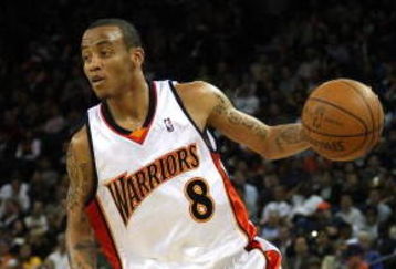 OAKLAND, CA - MARCH 30:  Monta Ellis #8 of the Golden State Warriors drives against the Memphis Grizzlies during an NBA game on March 30, 2009 at Oracle Arena in Oakland, California. NOTE TO USER: User expressly acknowledges and agrees that, by downloading and or using this photograph, User is consenting to the terms and conditions of the Getty Images License Agreement.  (Photo by Jed Jacobsohn/Getty Images)