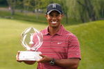 DUBLIN, OH - JUNE 07: Tiger Woods poses with the trophy after a one-stroke victory at the Memorial Tournament at the Muirfield Village Golf Club on June 7, 2009 in Dublin, Ohio. (Photo by Scott Halleran/Getty Images)