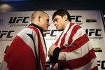 MANCHESTER, UNITED KINGDOM - FEBRUARY 23:  British Ultimate Fighting Champion Michael Bisping (L) and US fighter Forrest Griffin pose for photographs during the photocall to announce the arrival of Ultimate Fighting Championship bouts in the UK. 23 February, 2007, Manchester, England. Ultimate fighting, a mixture of martial arts is claimed to be one of the world's fastest growing sports and the largest championship in Britain is to be staged at Manchester's MEN arena on 21st April.  (Photo by Christopher Furlong/Getty Images)