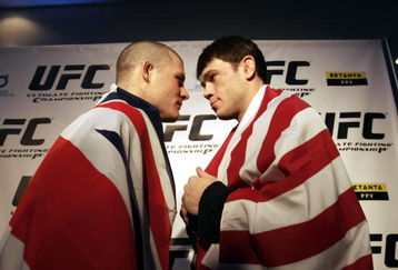 MANCHESTER, UNITED KINGDOM - FEBRUARY 23:  British Ultimate Fighting Champion Michael Bisping (L) and US fighter Forrest Griffin pose for photographs during the photocall to announce the arrival of Ultimate Fighting Championship bouts in the UK. 23 February, 2007, Manchester, England. Ultimate fighting, a mixture of martial arts is claimed to be one of the world's fastest growing sports and the largest championship in Britain is to be staged at Manchester's MEN arena on 21st April.  (Photo by Christopher Furlong/Getty Images)