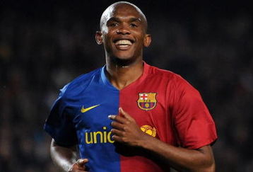 BARCELONA, SPAIN - MARCH 22:  Samuel Eto'o of Barcelona smiles as he celebrates scoring his sides sixth goal during the La Liga match between Barcelona and Malaga at the Camp Nou Stadium on March 22, 2009 in Barcelona, Spain. Barcelona won the match 6-0.  (Photo by Jasper Juinen/Getty Images)