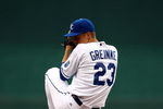 KANSAS CITY, MO - JUNE 17:  Starting pitcher Zack Greinke #23 of the Kansas City Royals pitches just prior to the start of the game against  the Arizona Diamondbacks on June 17, 2009 at Kauffman Stadium in Kansas City, Missouri.  (Photo by Jamie Squire/Getty Images)