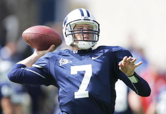 PROVO, UT - SEPTEMBER 23:   Quarterback Jason Beck #7 of BYU warms up prior to the game against Utah State September 23, 2006 in Provo, Utah. BYU defeated Utah State 38-0.  (Photo by Kent Horner/Getty Images)    