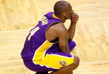ORLANDO, FL - JUNE 14:  Kobe Bryant #24 of the Los Angeles Lakers reacts during the game against the Orlando Magic in Game Five of the 2009 NBA Finals on June 14, 2009 at Amway Arena in Orlando, Florida.  The Lakers won 99-86.  NOTE TO USER:  User expressly acknowledges and agrees that, by downloading and or using this photograph, User is consenting to the terms and conditions of the Getty Images License Agreement.  (Photo by Chris Graythen/Getty Images)