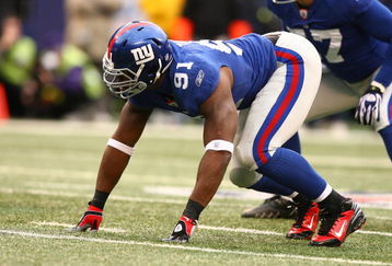 EAST RUTHERFORD, NJ - NOVEMBER 16:  Justin Tuck #91 of the New York Giants of the Baltimore Ravens during their game on November 16, 2008 at Giants Stadium in East Rutherford, New Jersey.  (Photo by Al Bello/Getty Images)