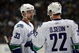 ANAHEIM, CA - MARCH 11:  Henrik Sedin #33 of the Vancouver Canucks has a word with teammate and brother Daniel Sedin #22 during a break in NHL game action against the Anaheim Ducks at Honda Center on March 11, 2009 in Anaheim, California. The Ducks defeated the Canucks 4-3 in overtime.  (Photo by Victor Decolongon/Getty Images)