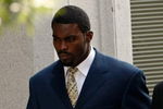 RICHMOND, VA - AUGUST 27:  Atlanta Falcons quarterback Michael Vick (L) arrives at federal court August 27, 2007 in Richmond, Virginia. The football star was expected to plead guilty to a federal dogfighting conspiracy charge. The NFL has suspended Vick indefinitely.   (Photo by Win McNamee/Getty Images)