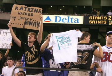 EAST RUTHERFORD, NJ - SEPTEMBER 19:  The New Orleans Saints fans hold up signs about hurrican Katrina during the game with the New York Giants on September 19, 2005 at Giants Stadium in East Rutherford, New Jersey. The Giants won 27-10. (Photo by Jim McIsaac/Getty Images)