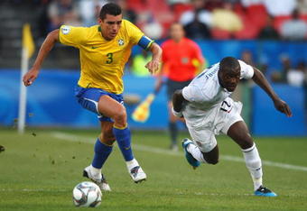 PRETORIA, SOUTH AFRICA - JUNE 18:  Jozy Altidore of USA battles with Lucio of Brazil during the FIFA Confederations Cup match between USA and Brasil at Loftus Versfeld Stadium on June 18, 2009 in Pretoria, South Africa.  (Photo by Jamie McDonald/Getty Images)