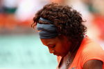 PARIS - JUNE 03:  Serena Williams of USA feels the pressure during the Women's Singles Quarter Final match against Svetlana Kuznetsova of Russia on day eleven of the French Open at Roland Garros on June 3, 2009 in Paris, France.  (Photo by Clive Brunskill/Getty Images)