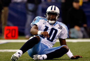 INDIANAPOLIS - DECEMBER 28:  Quarterback Vince Young #10 of the Tennessee Titans is slow to get up after taking a hit during the game against the Indianapolis Colts at Lucas Oil Stadium December 28, 2008 in Indianapolis, Indiana.  (Photo by Jamie Squire/Getty Images)