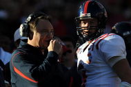 DALLAS - JANUARY 02:  Head coach Houston Nutt talks with Jevan Snead #4 of the Mississippi Rebels between downs against the Texas Tech Red Raiders during the AT&T Cotton Bowl on January 2, 2009 at the Cotton Bowl in Dallas, Texas.  (Photo by Ronald Martinez/Getty Images)