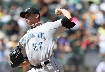 OAKLAND, CA - MAY 10:  Brett Cecil #27 of the Toronto Blue Jays pitches against the Oakland Athletics during a Major League Baseball game on May 10, 2009 at the Oakland Coliseum in Oakland, California.  (Photo by Jed Jacobsohn/Getty Images)