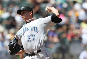 OAKLAND, CA - MAY 10:  Brett Cecil #27 of the Toronto Blue Jays pitches against the Oakland Athletics during a Major League Baseball game on May 10, 2009 at the Oakland Coliseum in Oakland, California.  (Photo by Jed Jacobsohn/Getty Images)