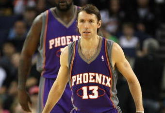 OAKLAND, CA - MARCH 15:  Steve Nash #13 and Shaquille O'Neal #32 of the Phoenix Suns look on against the Golden State Warriors during an NBA game on March 15, 2009 at Oracle Arena in Oakland, California. NOTE TO USER: User expressly acknowledges and agrees that, by downloading and or using this photograph, User is consenting to the terms and conditions of the Getty Images License Agreement.  (Photo by Jed Jacobsohn/Getty Images)